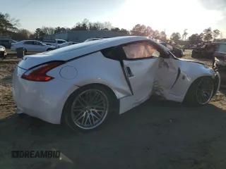 2014 Nissan 370Z Touring with VIN JN1AZ4EH8EM631324, listed as a Copart auction lot 85573524 with 0 mi miles and Salvage Title. Bid and sale history available at carsss.com. Image 3.