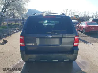 2009 Ford Escape XLT with VIN 1FMCU03709KB87490, listed as a IAAI auction lot 41989526 with 186,207 mi miles. Bid and sale history available at carsss.com. Image 16.