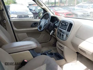 2003 Ford Escape XLT Popular 2 with VIN 1FMYU93193KB76369, listed as a IAAI auction lot 41895790 with 245,320 mi miles and . Bid and sale history available at DreamBid. Image 5.