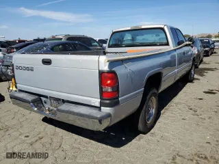 2000 Dodge Ram 1500 with VIN 3B7HC13Y4YG120005, listed as a Copart auction lot 57108154 with 124,940 mi miles and Salvage Title. Bid and sale history available at carsss.com. Image 3.