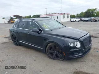 2018 Bentley Bentayga Signature z VIN SJAAC2ZV8JC017393, wystawiony jako IAAI lot #40349518 z przebiegiem 71 203 mil mil oraz . Historia ofert i sprzedaży dostępna na DreamBid. Obrazek 1.