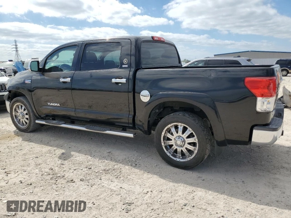 2012 Toyota Tundra 4WD Truck with VIN 5TFDW5F16CX247953, listed as a Copart auction lot 52457445 with 215,411 mi miles and Salvage Title. Bid and sale history available at carsss.com. Image 2.