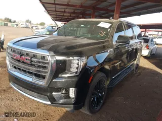 2024 GMC Yukon XL SLT with VIN 1GKS2GKD2RR157523, listed as a IAAI auction lot 41600219 with 52,444 mi miles. Bid and sale history available at carsss.com. Image 18.