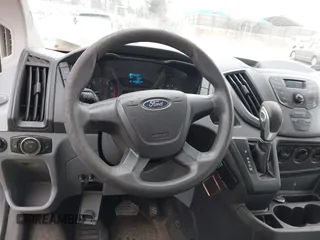 2015 Ford Transit Cargo with VIN 1FTNE1ZM6FKA18311, listed as a IAAI auction lot 41360162 with 149,897 mi miles. Bid and sale history available at carsss.com. Image 21.