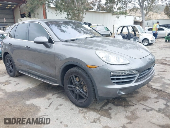 2012 Porsche Cayenne S Hybrid with VIN WP1AE2A25CLA90636, listed as a IAAI auction lot 41922089 with 90,318 mi miles and . Bid and sale history available at DreamBid. Image 1.