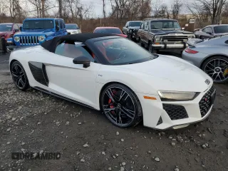 2020 Audi R8 Spyder performance z VIN WUA4BCFX3L7901606, wystawiony jako Copart lot #50161615 z przebiegiem 3 669 mil mil oraz Nie do naprawy • Non repairable. Historia ofert i sprzedaży dostępna na DreamBid. Obrazek 4.