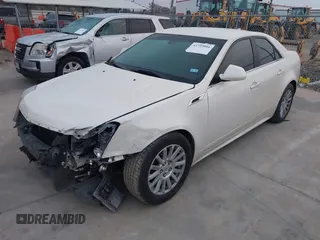 2013 Cadillac CTS Luxury z VIN 1G6DE5E53D0178112, wystawiony jako IAAI lot #41753094 z przebiegiem 262 955 mil mil oraz . Historia ofert i sprzedaży dostępna na DreamBid. Obrazek 2.