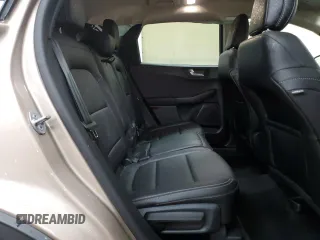 2020 Ford Escape SEL z VIN 1FMCU9H64LUC28297, wystawiony jako Copart lot #58693515 z przebiegiem 57 038 mil mil oraz Szkoda całkowita • Salvage title. Historia ofert i sprzedaży dostępna na DreamBid. Obrazek 11.