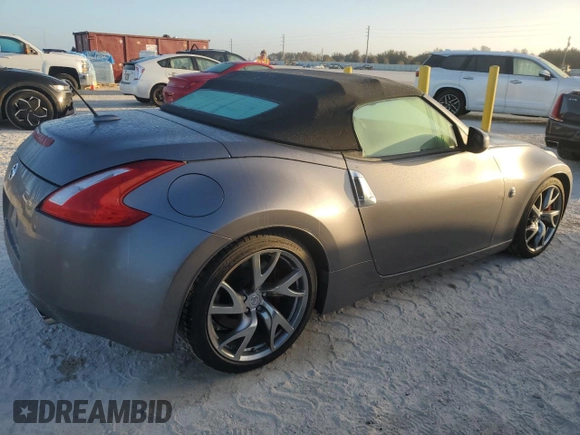 2014 Nissan 370Z Touring with VIN JN1AZ4FH4EM620092, listed as a Copart auction lot 77439254 with 38,662 mi miles and Salvage Title. Bid and sale history available at DreamBid. Image 3.