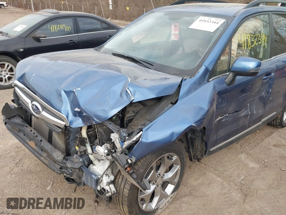 2016 Subaru Forester Touring с VIN JF2SJAXC4GH417596, выставлен на аукционе IAAI как лот 41832344 с пробегом 88 735 миль миль и . История ставок и продаж доступна на DreamBid. Изображение 6.