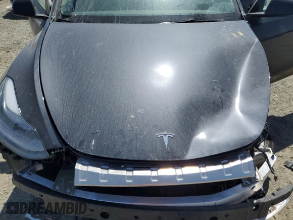 2024 Tesla Model Y Long Range z VIN 7SAYGDEE6RF032348, wystawiony jako Copart lot #58158355 z przebiegiem Nie podano mil oraz Szkoda całkowita • Salvage title. Historia ofert i sprzedaży dostępna na DreamBid. Obrazek 12.