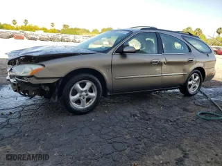 2002 Ford Taurus SE with VIN 1FAFP58S02G278065, listed as a Copart auction lot 53030885 with 131,984 mi miles and Salvage Title. Bid and sale history available at carsss.com. Image 1.