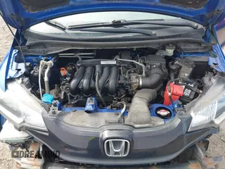 2015 Honda Fit LX with VIN 3HGGK5H52FM710434, listed as a IAAI auction lot 42022022 with 104,118 mi miles. Bid and sale history available at carsss.com. Image 10.