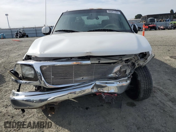 2003 Ford F-150 XLT with VIN 1FTRW07653KB64255, listed as a Copart auction lot 48341125 with 324,912 mi miles and Salvage Title. Bid and sale history available at carsss.com. Image 5.