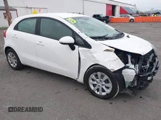 2013 Kia Rio LX with VIN KNADM5A34D6110013, listed as a IAAI auction lot 41306019 with 80,501 mi miles and . Bid and sale history available at DreamBid. Image 1.
