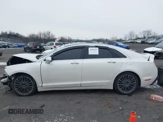 2014 Lincoln MKZ with VIN 3LN6L2J99ER819229, listed as a IAAI auction lot 41005075 with Not Provided miles. Bid and sale history available at carsss.com. Image 14.