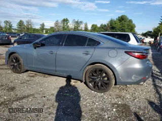 2021 Mazda 6 Grand Touring Reserve with VIN JM1GL1WY3M1602898, listed as a Copart auction lot 67871314 with 104,679 mi miles and Salvage Title. Bid and sale history available at DreamBid. Image 2.