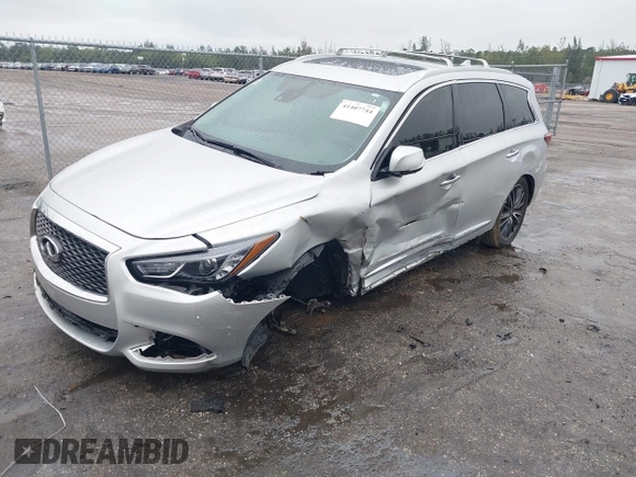 2019 Infiniti QX60 Pure z VIN 5N1DL0MM9KC534133, wystawiony jako IAAI lot #41407744 z przebiegiem 215 402 mil mil oraz . Historia ofert i sprzedaży dostępna na DreamBid. Obrazek 18.