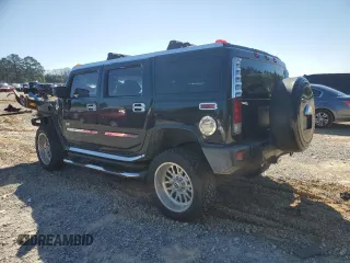 2006 Hummer H2 z VIN 5GRGN23U06H104393, wystawiony jako Copart lot #46208975 z przebiegiem 168 053 mil mil oraz Szkoda całkowita • Salvage title. Historia ofert i sprzedaży dostępna na DreamBid. Obrazek 2.