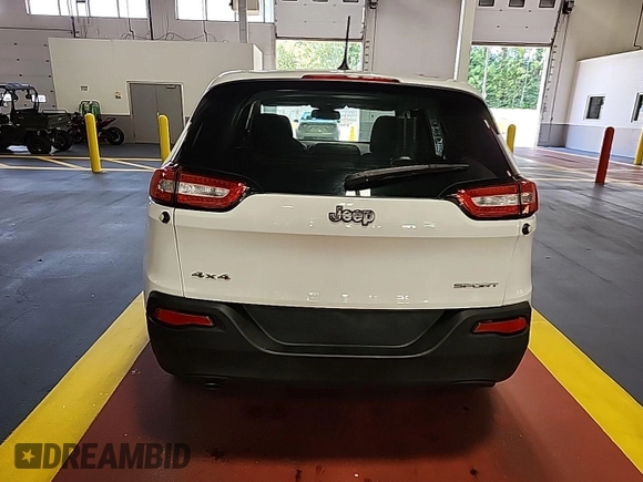 2015 Jeep Cherokee Sport with VIN 1C4PJMAB8FW685146, listed as a IAAI auction lot 42842417 with 130,325 mi miles and . Bid and sale history available at DreamBid. Image 32.