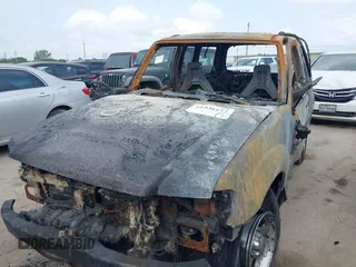 2002 Ford Explorer Sport Value with VIN 1FMYU60E02UB37971, listed as a IAAI auction lot 41936153 with Not provided miles and . Bid and sale history available at DreamBid. Image 2.