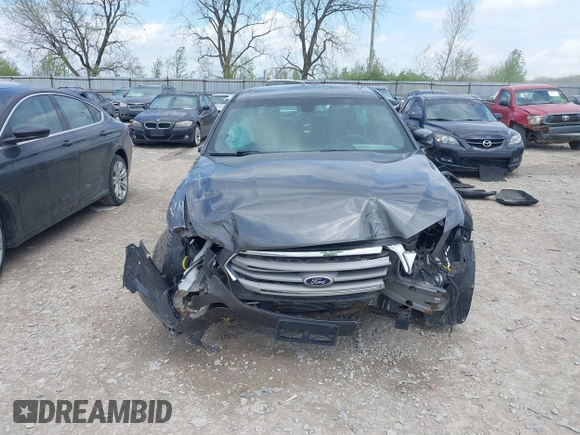 2015 Ford Taurus SEL with VIN 1FAHP2E81FG122378, listed as a IAAI auction lot 42081001 with 159,853 mi miles and . Bid and sale history available at carsss.com. Image 13.