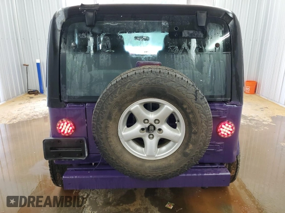 2004 Jeep Wrangler X with VIN 1J4FA39S64P734226, listed as a Copart auction lot 59389795 with 107,373 mi miles and Clean title. Bid and sale history available at DreamBid. Image 6.