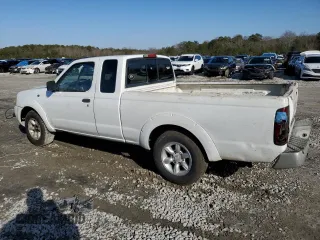 2003 Nissan Frontier XE with VIN 1N6DD26T63C467751, listed as a Copart auction lot 41842545 with 397,556 mi miles and Salvage title. Bid and sale history available at DreamBid. Image 2.