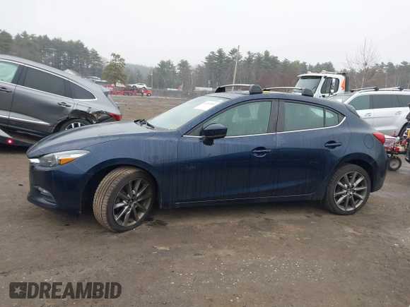 2018 Mazda 3 Touring with VIN 3MZBN1L34JM204883, listed as a IAAI auction lot 41094541 with 125,205 mi miles and . Bid and sale history available at DreamBid. Image 14.