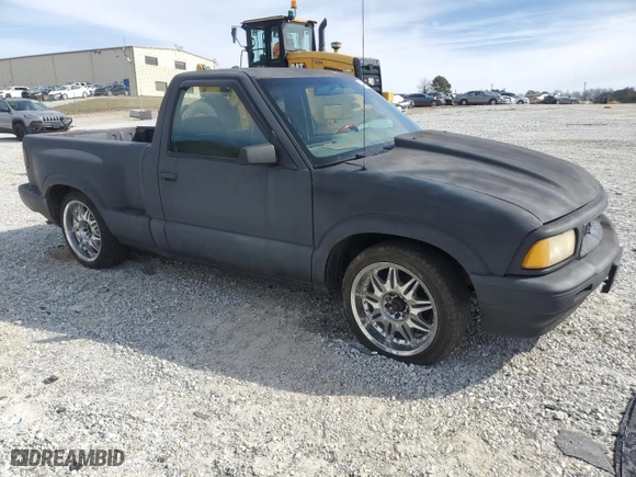 1997 GMC Sonoma SLS with VIN 1GTCS14X8VK507860, listed as a Copart auction lot 45328845 with 243,382 mi miles and Salvage Title. Bid and sale history available at carsss.com. Image 4.