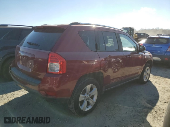 2012 Jeep Compass Sport with VIN 1C4NJCBB2CD631834, listed as a Copart auction lot 82886354 with 208,705 mi miles and Salvage Title. Bid and sale history available at carsss.com. Image 3.