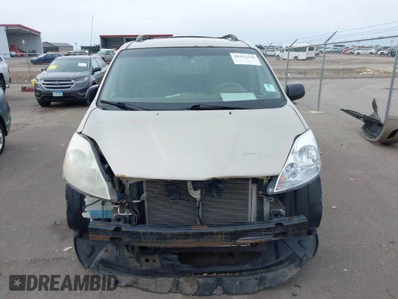 2007 Toyota Sienna CE with VIN 5TDZK23C27S006778, listed as a IAAI auction lot 41932534 with 244,921 mi miles. Bid and sale history available at carsss.com. Image 12.