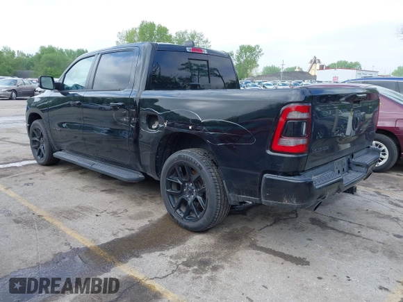 2023 Ram 1500 Laramie with VIN 1C6SRFJTXPN541328, listed as a IAAI auction lot 42121615 with 61,939 mi miles and . Bid and sale history available at DreamBid. Image 3.
