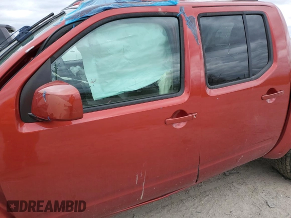 2012 Nissan Frontier Pro-4X z VIN 1N6AD0EV8CC454476, wystawiony jako Copart lot #53110155 z przebiegiem Nie podano mil oraz Szkoda całkowita • Salvage title. Historia ofert i sprzedaży dostępna na DreamBid. Obrazek 7.