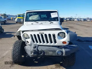 2011 Jeep Wrangler Rubicon with VIN 1J4HA6D17BL620734, listed as a IAAI auction lot 41219266 with 83,796 mi miles and . Bid and sale history available at carsss.com. Image 12.