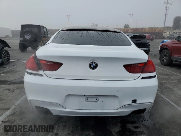 2014 BMW 6 Series 650i z VIN WBA6B2C59ED128936, wystawiony jako Copart lot #46409685 z przebiegiem 53 208 mil mil oraz Szkoda całkowita • Salvage title. Historia ofert i sprzedaży dostępna na DreamBid. Obrazek 6.