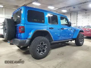 2022 Jeep Wrangler Unlimited Rubicon with VIN 1C4JJXR69NW190564, listed as a Copart auction lot 83703504 with 16,803 mi miles and Salvage title. Bid and sale history available at DreamBid. Image 3.