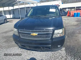 2011 Chevrolet Suburban LT with VIN 1GNSCJE06BR402433, listed as a IAAI auction lot 41819335 with 203,335 mi miles. Bid and sale history available at carsss.com. Image 12.
