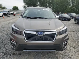 2021 Subaru Forester Touring z VIN JF2SKAXC0MH560263, wystawiony jako Copart lot #61453195 z przebiegiem Nie podano mil oraz Szkoda całkowita • Salvage title. Historia ofert i sprzedaży dostępna na DreamBid. Obrazek 5.