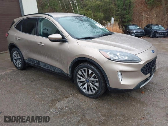 2021 Ford Escape Titanium Hybrid with VIN 1FMCU9DZXMUA66161, listed as a IAAI auction lot 41208651 with 61,198 mi miles and . Bid and sale history available at DreamBid. Image 1.