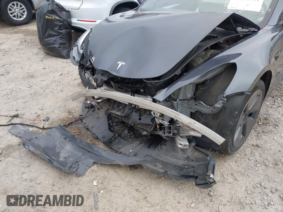 2022 Tesla Model 3 Long Range z VIN 5YJ3E1EB8NF315359, wystawiony jako IAAI lot #42035599 z przebiegiem 54 974 mil mil oraz . Historia ofert i sprzedaży dostępna na DreamBid. Obrazek 20.
