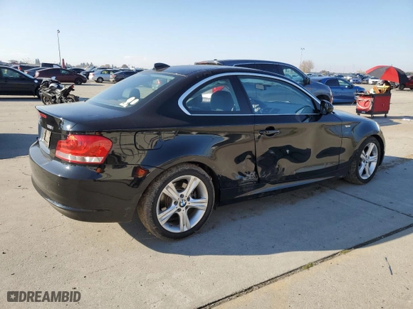 2013 BMW 1 Series 128i with VIN WBAUP9C5XDVS95834, listed as a Copart auction lot 83249614 with 0 mi miles and Salvage Title. Bid and sale history available at carsss.com. Image 3.