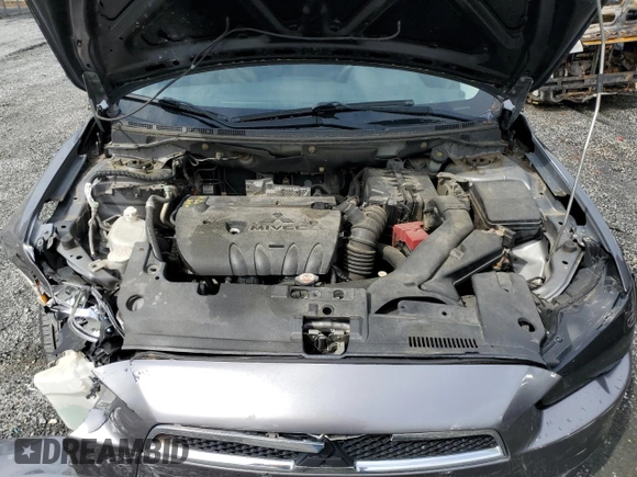 2014 Mitsubishi Lancer ES with VIN JA32U2FUXEU003358, listed as a Copart auction lot 55555935 with 185,151 mi miles and Salvage title. Bid and sale history available at DreamBid. Image 11.