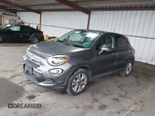 2016 FIAT 500X Easy z VIN ZFBCFXBTXGP349005, wystawiony jako IAAI lot #41163593 z przebiegiem 69 012 mil mil oraz . Historia ofert i sprzedaży dostępna na DreamBid. Obrazek 2.