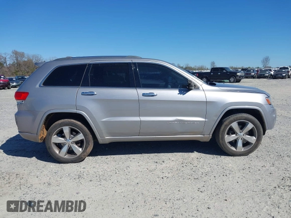 2014 Jeep Grand Cherokee Overland with VIN 1C4RJECG9EC206787, listed as a IAAI auction lot 41730875 with 194,196 mi miles. Bid and sale history available at carsss.com. Image 13.