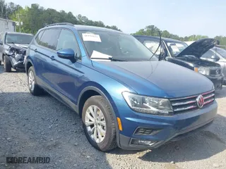 2018 Volkswagen Tiguan S with VIN 3VV0B7AXXJM018455, listed as a IAAI auction lot 41979115 with 92,104 mi miles. Bid and sale history available at carsss.com. Image 1.