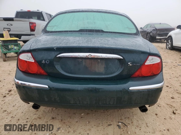 2002 Jaguar S-Type with VIN SAJDA01P12GM27242, listed as a Copart auction lot 88579215 with 218,546 mi miles and Salvage Title. Bid and sale history available at DreamBid. Image 6.