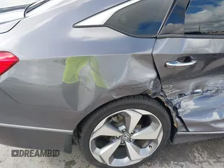 2020 Honda Accord Touring z VIN 1HGCV2F93LA023062, wystawiony jako IAAI lot #42596772 z przebiegiem 53 586 mil mil oraz . Historia ofert i sprzedaży dostępna na DreamBid. Obrazek 17.