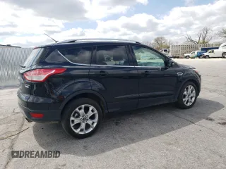 2015 Ford Escape Titanium z VIN 1FMCU0J94FUC07857, wystawiony jako Copart lot #52682825 z przebiegiem 62 100 mil mil oraz Szkoda całkowita • Salvage title. Historia ofert i sprzedaży dostępna na DreamBid. Obrazek 3.