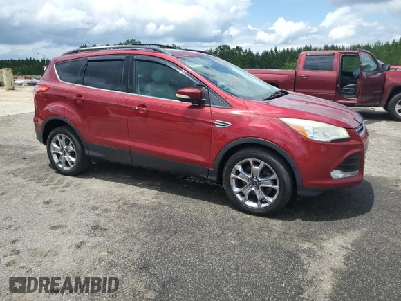 2013 Ford Escape SEL with VIN 1FMCU0HX6DUC52266, listed as a Copart auction lot 60042515 with 145,763 mi miles and Clean title. Bid and sale history available at DreamBid. Image 4.